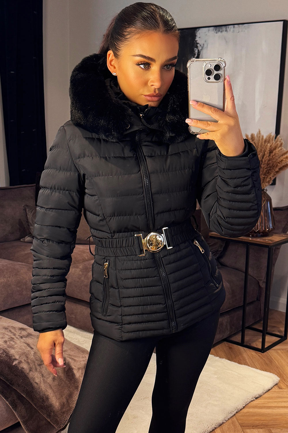 Black Puffer Jacket With Faux Fur Hood And Gold Belt