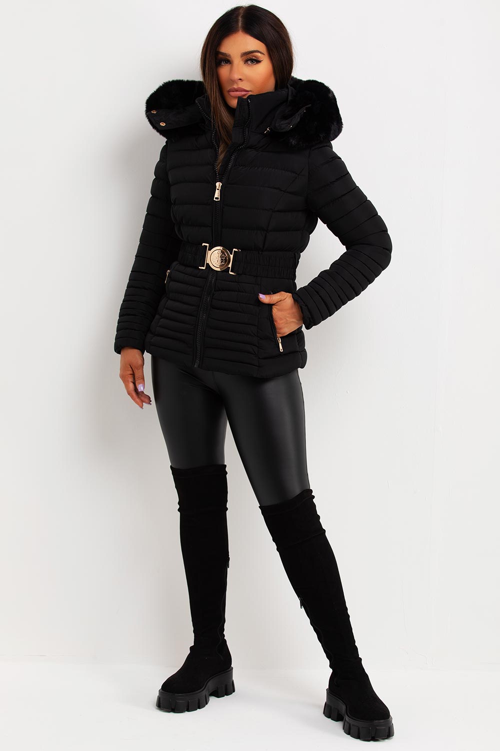 Black Puffer Jacket With Faux Fur Hood And Gold Belt