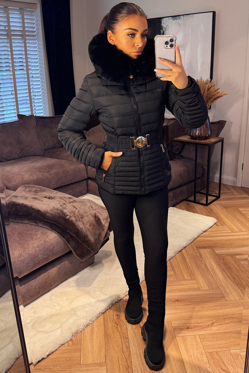 Black Puffer Jacket With Faux Fur Hood And Gold Belt