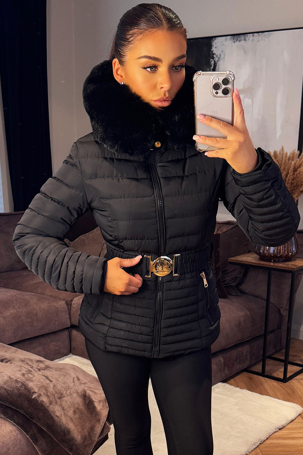 Black Puffer Jacket With Faux Fur Hood And Gold Belt