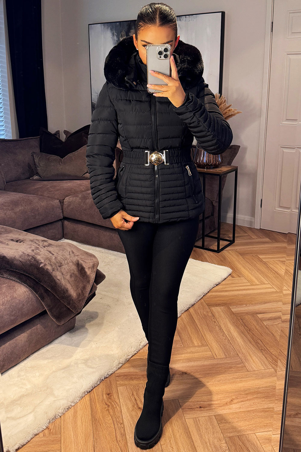 Black Puffer Jacket With Faux Fur Hood And Gold Belt