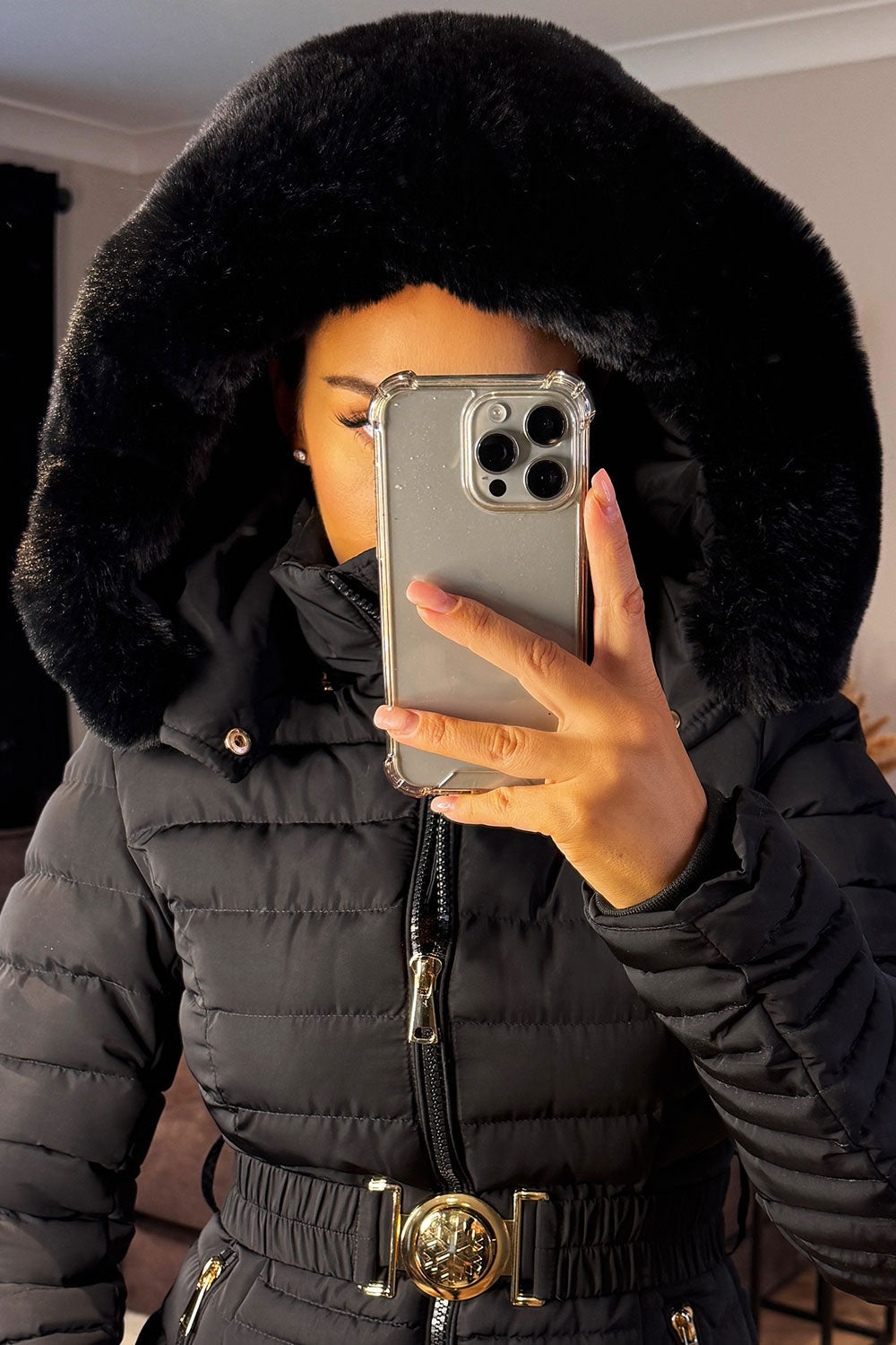 Black Puffer Jacket With Faux Fur Hood And Gold Belt