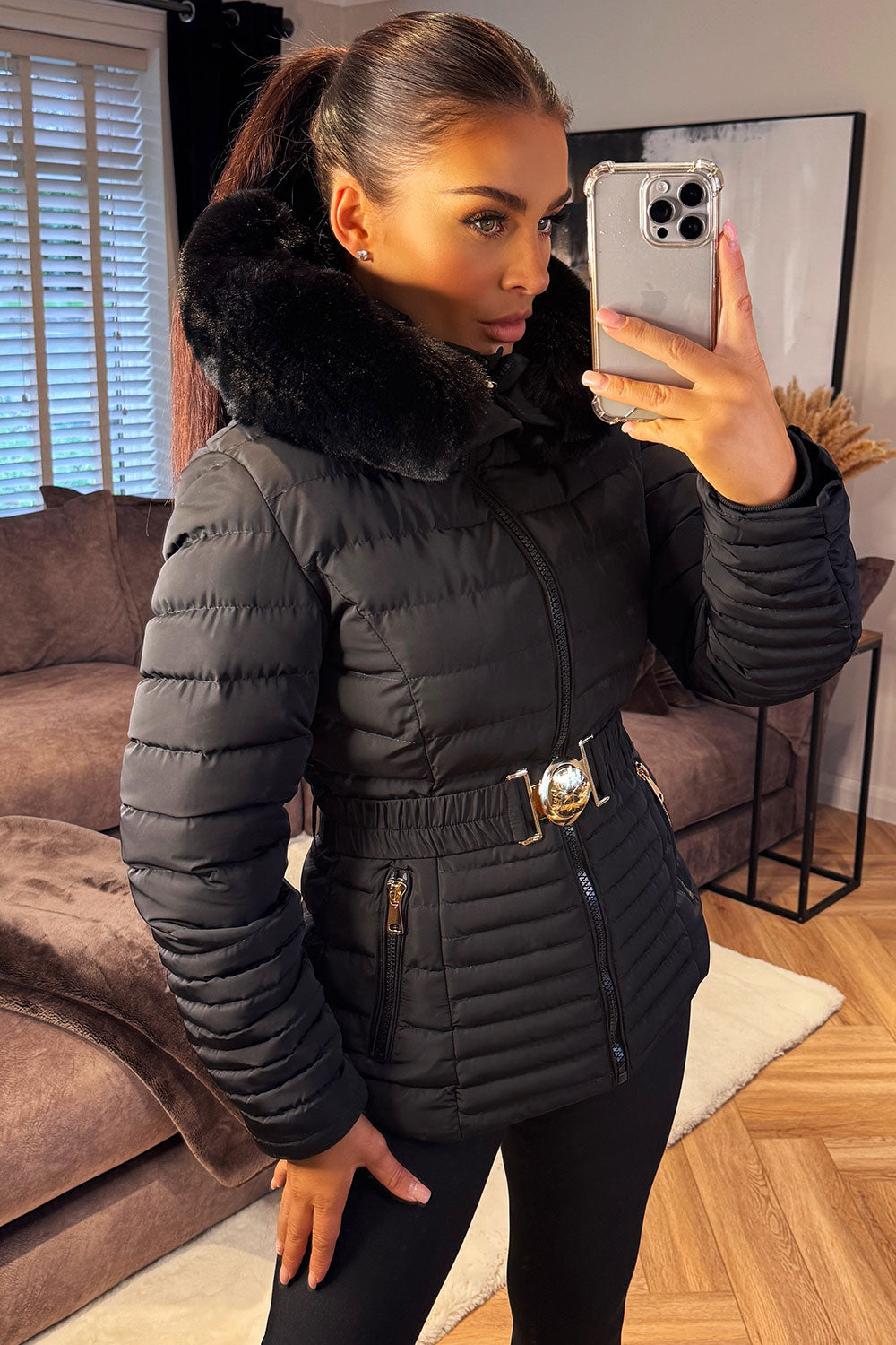 Black Puffer Jacket With Faux Fur Hood And Gold Belt