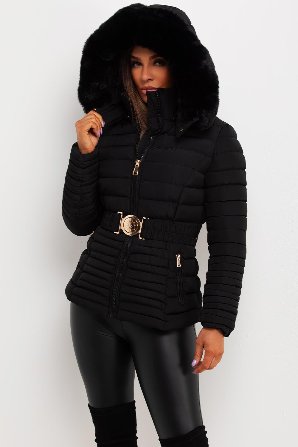 Black Puffer Jacket With Faux Fur Hood And Gold Belt