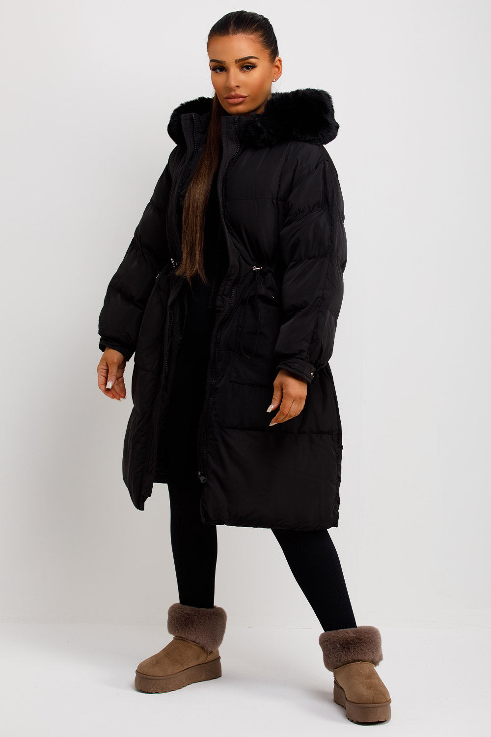 Long Black Puffer Coat With Faux Fur Hood And Drawstring Waist