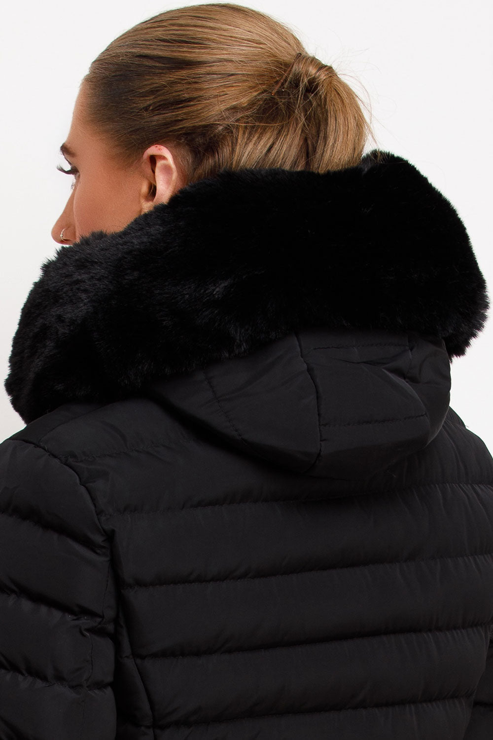 Black Puffer Jacket With Faux Fur Hood And Gold Belt