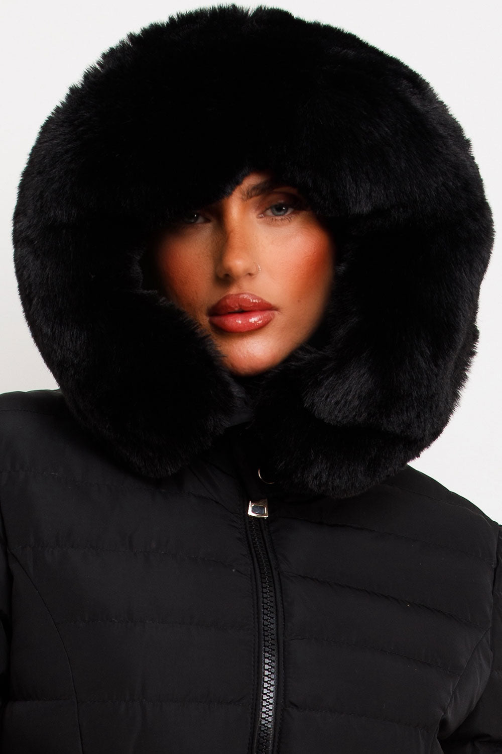 Black Puffer Jacket With Faux Fur Hood And Gold Belt