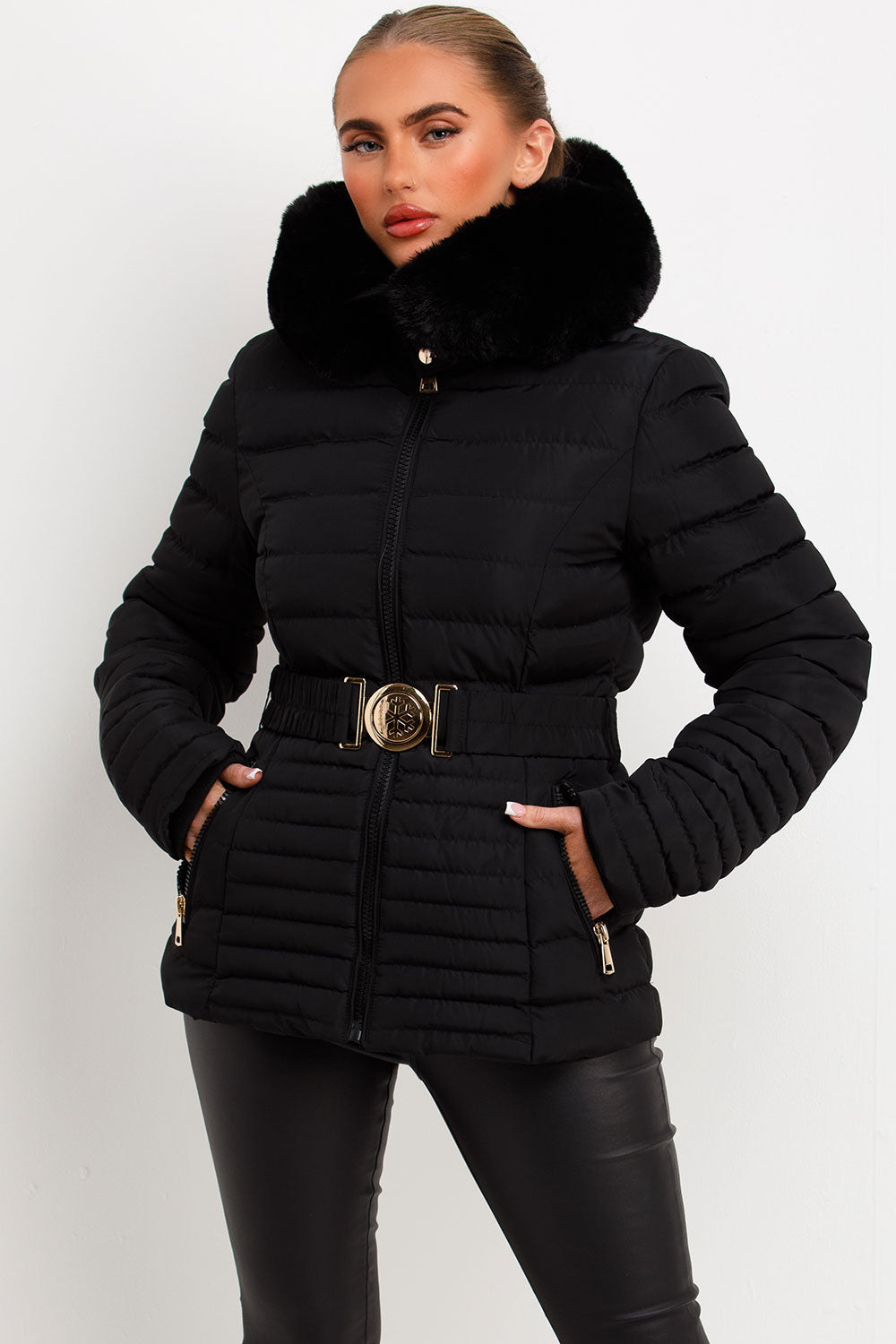 Black Puffer Jacket With Faux Fur Hood And Gold Belt