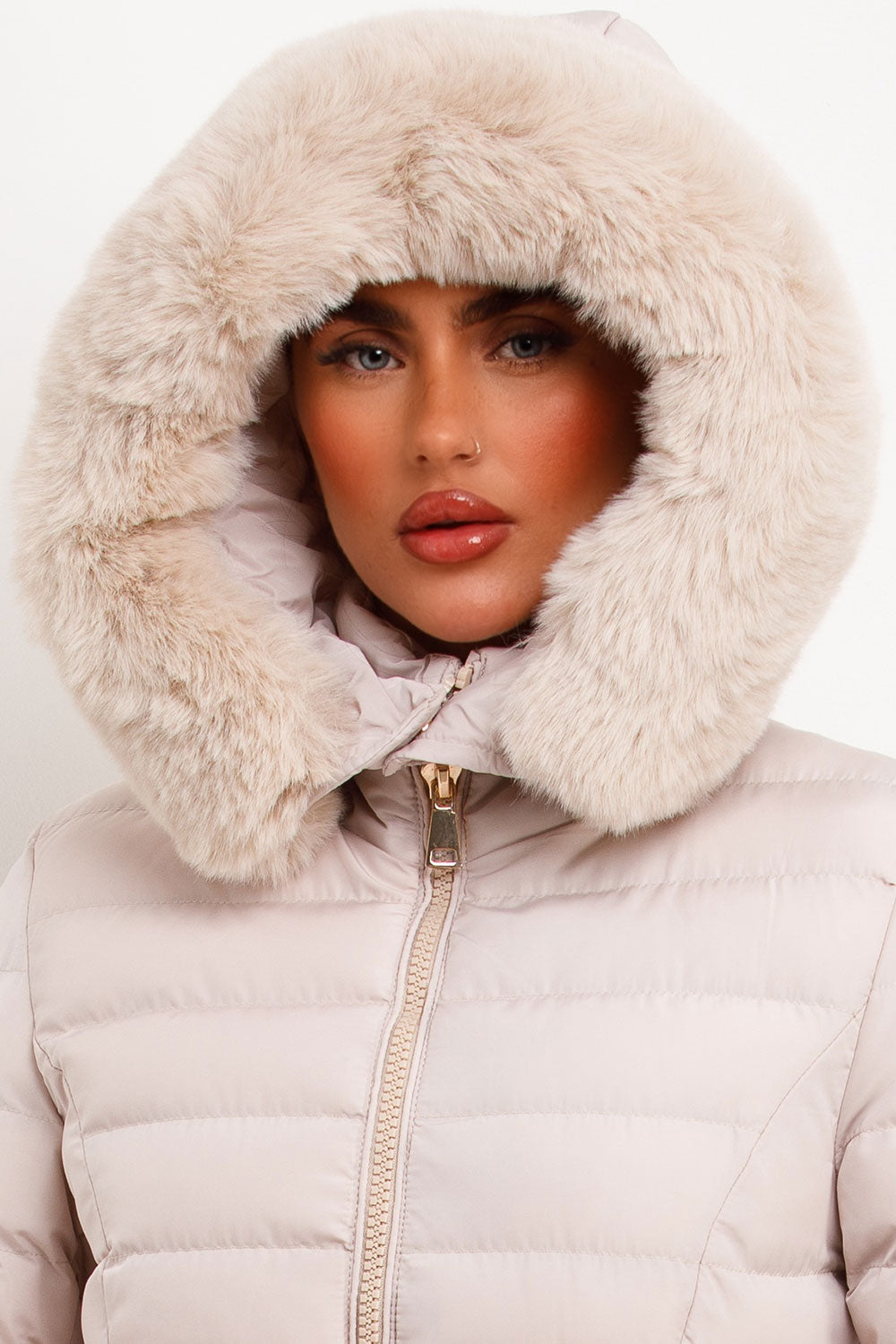 Puffer Jacket With Faux Fur Hood And Gold Belt Beige