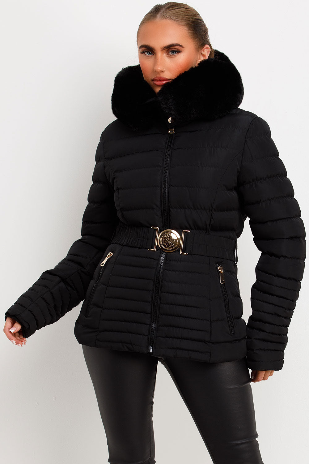 Black Puffer Jacket With Faux Fur Hood And Gold Belt