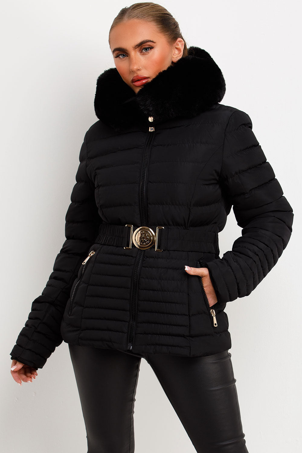 Black Puffer Jacket With Faux Fur Hood And Gold Belt